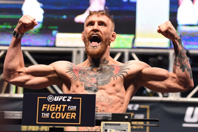 LAS VEGAS, NV - DECEMBER 11:   UFC interim featherweight champion Conor McGregor of Ireland weighs in during the UFC 194 weigh-in inside MGM Grand Garden Arena on December 10, 2015 in Las Vegas, Nevada.  (Photo by Josh Hedges/Zuffa LLC/Zuffa LLC via Getty Images)