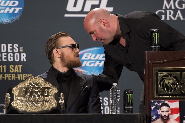 LAS VEGAS, NV - JULY 11:  UFC President Dana White (R) speaks with UFC interim featherweight champion Conor McGregor during the UFC 189 post fight press conference at the MGM Grand Garden Arena on July 11, 2015 in Las Vegas, Nevada. (Photo by Jeff Bottari/Zuffa LLC/Zuffa LLC via Getty Images)