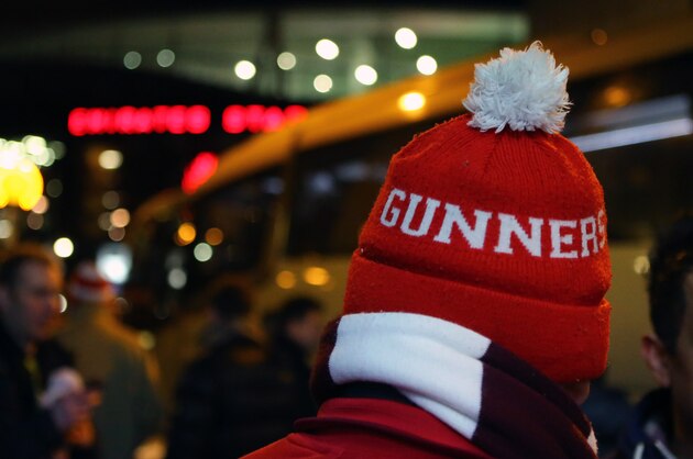 LONDON, ENGLAND - FEBRUARY 23 :  An Arsenal fan wearing a Gunners hat before the UEFA Champions League match between Arsenal and Barcelona at the Emirates Stadium on February 23, 2016 in London, United Kingdom.  (Photo by Catherine Ivill - AMA/Getty Images)
