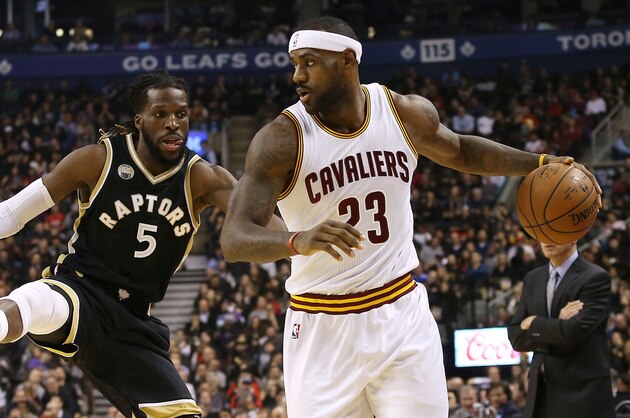 TORONTO, ON - NOVEMBER 25: DeMarre Carroll #5 of the Toronto Raptors defends against LeBron James #23 of the Cleveland Cavaliers on November 25, 2015 at Air Canada Centre in Toronto, Ontario, Canada. NOTE TO USER: User expressly acknowledges and agrees that, by downloading and or using this photograph, User is consenting to the terms and conditions of the Getty Images License Agreement. Mandatory Copyright Notice: Copyright 2015 NBAE (Photo by Dave Sandford/NBAE via Getty Images) TORONTO, ON - NOVEMBER 25: DeMarre Carroll #5 of the Toronto Raptors defends against LeBron James #23 of the Cleveland Cavaliers on November 25, 2015 at Air Canada Centre in Toronto, Ontario, Canada. NOTE TO USER: User expressly acknowledges and agrees that, by downloading and or using this photograph, User is consenting to the terms and conditions of the Getty Images License Agreement. Mandatory Copyright Notice: Copyright 2015 NBAE (Photo by Dave Sandford/NBAE via Getty Images)