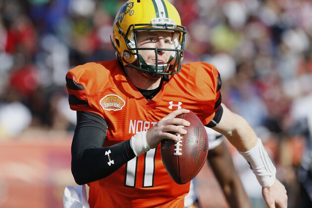 North squad quarterback Carson Wentz of North Dakota State (11) runs the ball during the Senior Bowl NCAA college football game, Saturday, Jan. 30, 2016, at Ladd–Peebles Stadium, in Mobile, Ala. (AP Photo/Brynn Anderson)