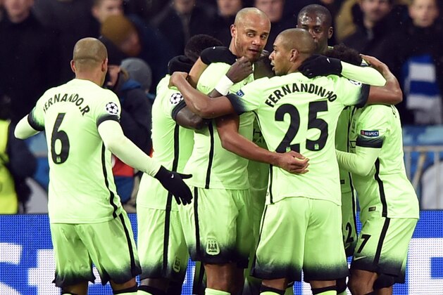 Manchester City's Argentinian forward Sergio Aguero celebrates with his teammates after scoring during the UEFA Champions league round of 16, first leg, football match FC Dynamo Kyiv vs Manchester City  FC at the NSC Olimpiski stadium in Kiev on February 24, 2016.   AFP PHOTO / SERGEI SUPINSKY / AFP / SERGEI SUPINSKY        (Photo credit should read SERGEI SUPINSKY/AFP/Getty Images)