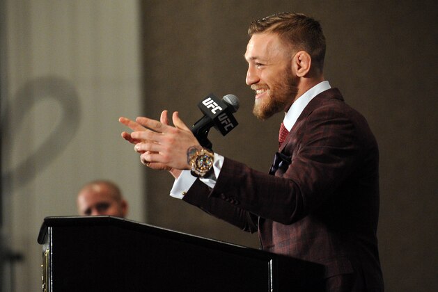 December 12, 2015; Las Vegas, NV, USA; Conor McGregor speaks following his victory against Jose Aldo UFC 194 press conference at MGM Grand Garden Arena. Mandatory Credit: Gary A. Vasquez-USA TODAY Sports