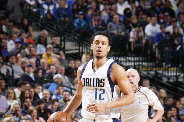 DALLAS, TX - DECEMBER 30:  John Jenkins #12 of the Dallas Mavericks dribbles the ball against the Golden State Warriors on December 30, 2015 at the American Airlines Center in Dallas, Texas. NOTE TO USER: User expressly acknowledges and agrees that, by downloading and or using this photograph, User is consenting to the terms and conditions of the Getty Images License Agreement. Mandatory Copyright Notice: Copyright 2015 NBAE (Photo by Danny Bollinger/NBAE via Getty Images)