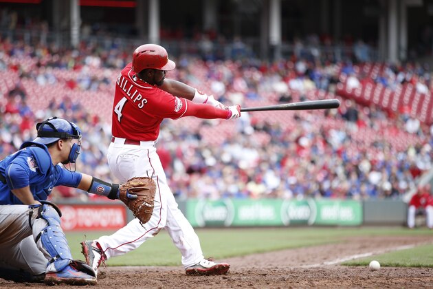 CINCINNATI, OH - OCTOBER 1: Brandon Phillips #4 of the Cincinnati Reds singles to left center to drive in a run against the Chicago Cubs in the seventh inning at Great American Ball Park on October 1, 2015 in Cincinnati, Ohio. The Cubs defeated the Reds 5-3. (Photo by Joe Robbins/Getty Images)