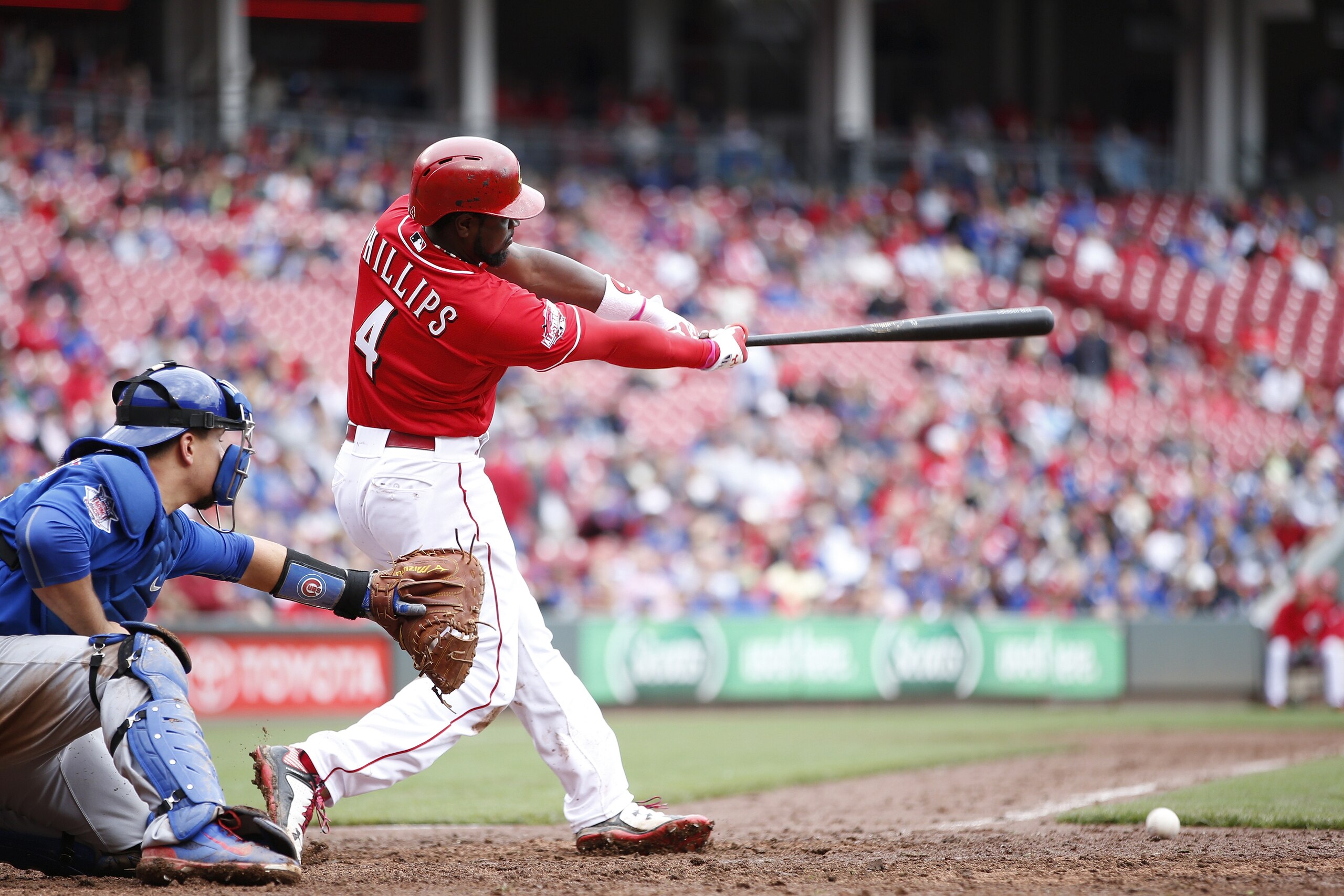 CINCINNATI, OH - OCTOBER 1: Brandon Phillips #4 of the Cincinnati Reds singles to left center to drive in a run against the Chicago Cubs in the seventh inning at Great American Ball Park on October 1, 2015 in Cincinnati, Ohio. The Cubs defeated the Reds 5-3. (Photo by Joe Robbins/Getty Images)