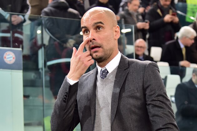Bayern Munich's Spanish coach Pep Guardiola gestures as he enters the pitch ahead of the UEFA Champions League round of 16 first leg football match between Juventus and Bayern Munich at the Juventus Stadium in Turin on February 23, 2016. AFP PHOTO / GIUSEPPE CACACE / AFP / GIUSEPPE CACACE        (Photo credit should read GIUSEPPE CACACE/AFP/Getty Images)