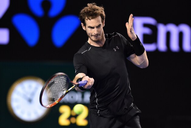 Britain's Andy Murray hits a return during the men's singles final against Serbia's Novak Djokovic on day 14 of the 2016 Australian Open tennis tournament in Melbourne on January 31, 2016. AFP PHOTO / PETER PARKS -- IMAGE RESTRICTED TO EDITORIAL USE - STRICTLY NO COMMERCIAL USE / AFP / PETER PARKS        (Photo credit should read PETER PARKS/AFP/Getty Images)