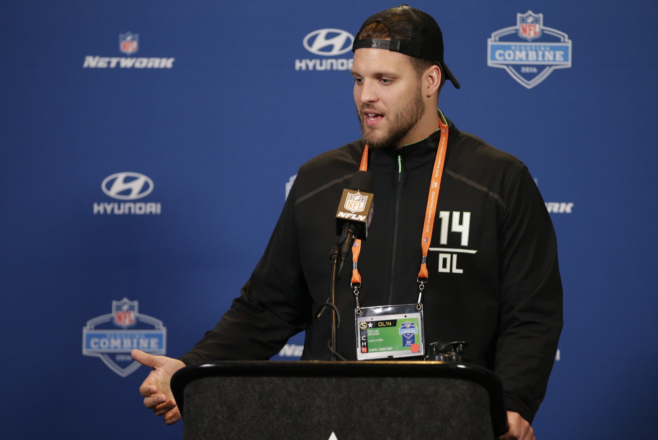 Ohio State offensive lineman Taylor Decker responds to a question during a news conference at the NFL football scouting combine Wednesday, Feb. 24, 2016, in Indianapolis.  (AP Photo/Darron Cummings)