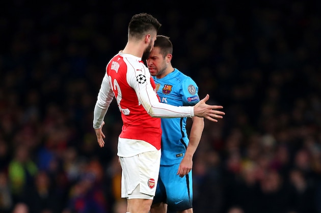 LONDON, ENGLAND - FEBRUARY 23 :  Jordi Alba of FC Barcelona appears to headbutt Olivier Giroud of Arsenal  during the UEFA Champions League match between Arsenal and Barcelona at the Emirates Stadium on February 23, 2016 in London, United Kingdom.  (Photo by Catherine Ivill - AMA/Getty Images)