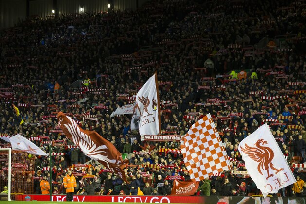 Liverpool supporters are seen at Anfield Stadium's Kop end before the English FA Cup fourth-round soccer match between Liverpool and West Ham United at Anfield Stadium, Liverpool, England, Saturday Jan. 30, 2016. (AP Photo/Jon Super)