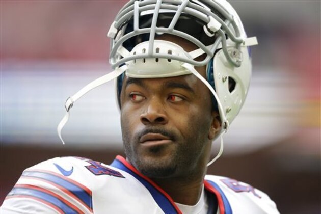 FILE - In this Oct. 25, 2015, file photo, Buffalo Bills defensive end Mario Williams stands on the field during warm-up before an NFL football game against the Jacksonville Jaguars at Wembley Stadium in London. A person with direct knowledge of discussions has told The Associated Press on Thursday, Dec. 31, 2015,  that the Bills plan to cut the high-priced defensive end this offseason. Williams has become expendable because his contract is deemed to be too expensive, and also because he has struggled to make the transition to the defensive system introduced by first-year coach Rex Ryan.   (AP Photo/Matt Dunham, File0
