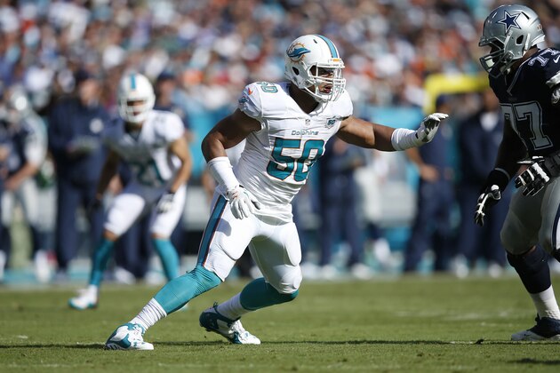 MIAMI GARDENS, FL - NOVEMBER 22: Olivier Vernon #50 of the Miami Dolphins in action against the Dallas Cowboys during the game at Sun Life Stadium on November 22, 2015 in Miami Gardens, Florida. Dallas defeated Miami 24-14. (Photo by Joe Robbins/Getty Images)