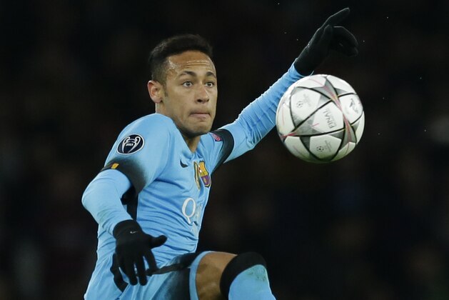 Barcelona's Neymar controls the ball during the Champions League round of 16 first leg soccer match between Arsenal and Barcelona at the Emirates stadium London, Tuesday, Feb. 23, 2016. (AP Photo/Matt Dunham)