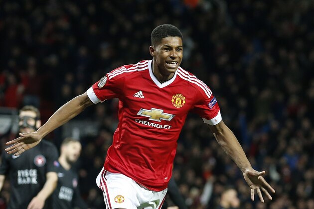 United’s Marcus Rashford celebrates after scoring  during the Europa League round of 32 second leg soccer match between Manchester United and FC Midtjylland in Manchester, England, Thursday, Feb. 25, 2016 . (AP Photo/Jon Super)