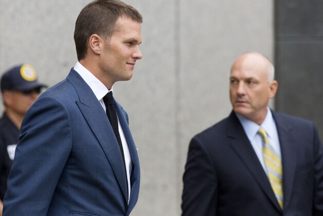 New England Patriots quarterback Tom Brady leaves federal court following a hearing in his