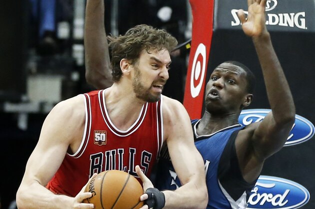 Chicago Bulls’ Pau Gasol, left, of Spain, tries to work around Minnesota Timberwolves’ Gorgui Dieng of Senegal in the second half of an NBA basketball game, Saturday, Feb. 6, 2016, in Minneapolis. The Timberwolves won 112-105. Gasol led the Bulls with 25 points while Dieng scored 24 for the Timberwolves. (AP Photo/Jim Mone)