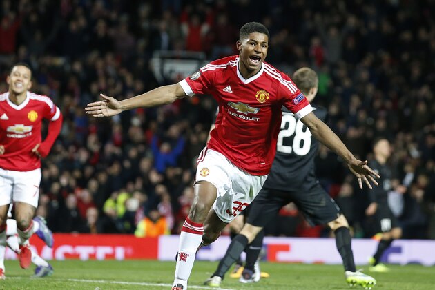 United’s Marcus Rashford celebrates after scoring  during the Europa League round of 32 second leg soccer match between Manchester United and FC Midtjylland in Manchester, England, Thursday, Feb. 25, 2016 . (AP Photo/Jon Super)
