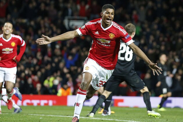 United’s Marcus Rashford celebrates after scoring  during the Europa League round of 32 second leg soccer match between Manchester United and FC Midtjylland in Manchester, England, Thursday, Feb. 25, 2016 . (AP Photo/Jon Super)