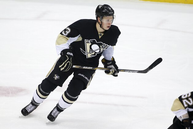 Pittsburgh Penguins' Olli Maatta (3) plays in an NHL hockey game against the New Jersey Devils in Pittsburgh, Tuesday, Jan. 26, 2016. (AP Photo/Gene J. Puskar)