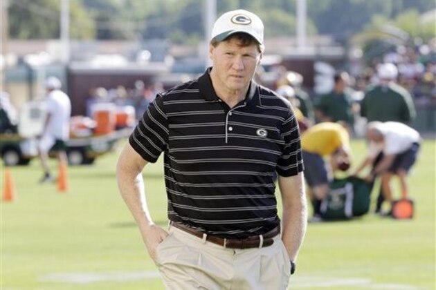 ADVANCE FOR WEEKEND EDITIONS, AUG 22-23 - FILE - In this July 30, 2015, file photo, Green Bay Packers president Mark Murphy walks on the field during NFL football training camp in Green Bay, Wis. Of all the notable accomplishments in Packers president Mark Murphy’s long career in football, outsmarting Joe Gibbs might stand out the most. “He's the player who was too smart for me to coach,” the former Redskins coach said with a laugh about his ex-safety. (AP Photo/Morry Gash, File)