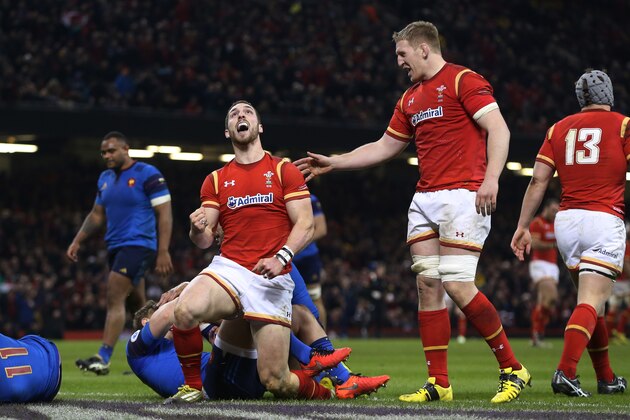 CARDIFF, WALES - FEBRUARY 26:  George North of Wales celebrates with teammate Bradley Davies (R) after scoring the opening try during the RBS Six Nations match between Wales and France at the Principality Stadium on February 26, 2016 in Cardiff, Wales.  (Photo by David Rogers/Getty Images)