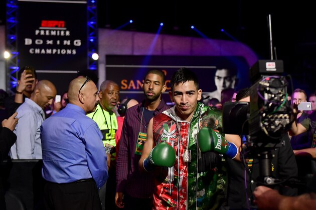 LOS ANGELES, CA - AUGUST 29:  Leo Santa Cruz makes his way to the ring to fight Abner Mares of Mexico during the WBC diamond featherweight and WBA featherweight championship bout at Staples Center on August 29, 2015 in Los Angeles, California.  Santa Cruz would win in a 12 round decision.  (Photo by Harry How/Getty Images)