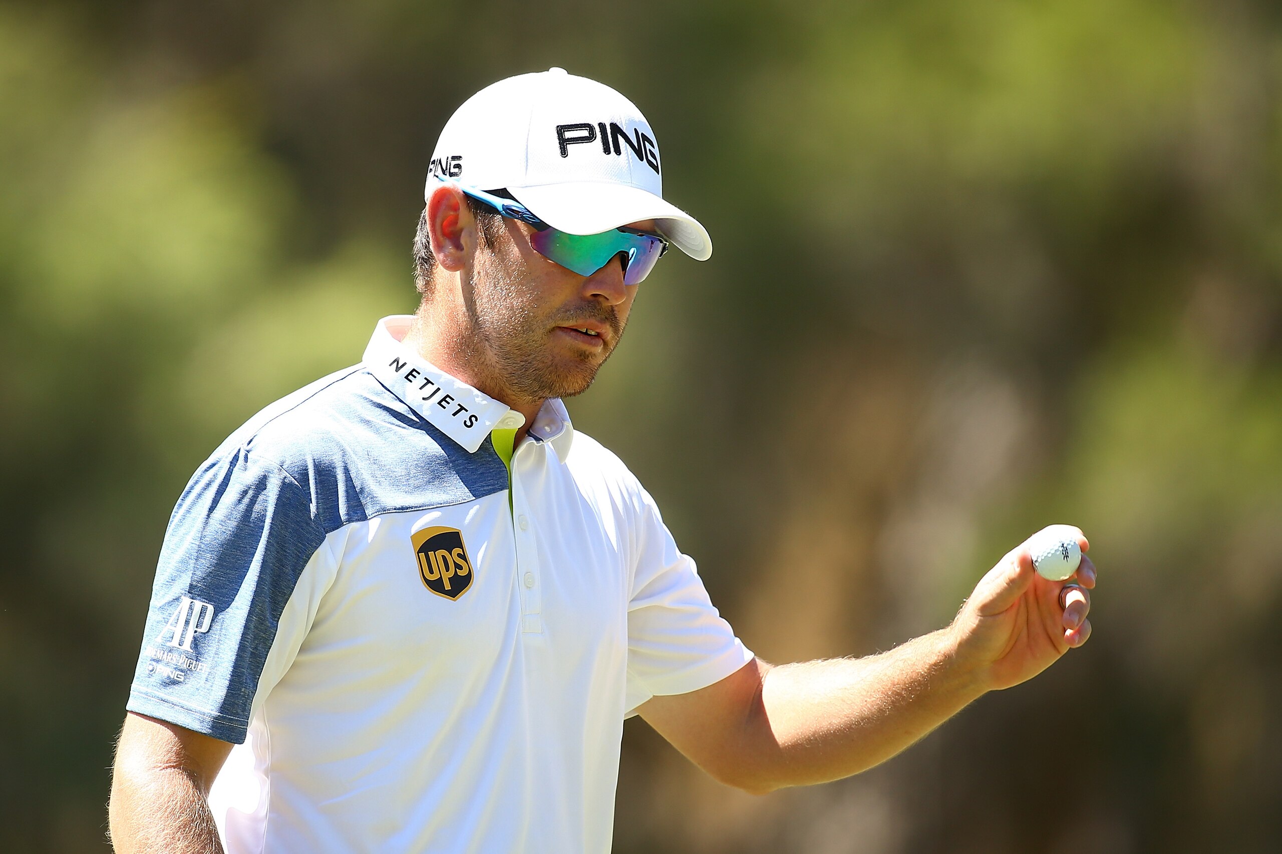 PERTH, AUSTRALIA - FEBRUARY 27:  Louis Oosthuizen of South Africa acknowledges the gallery after a birdie on the 3rd hole during day three of the 2016 Perth International at Karrinyup GC on February 27, 2016 in Perth, Australia.  (Photo by Paul Kane/Getty Images)