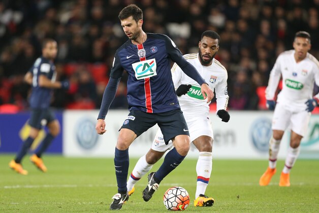 PARIS - FEBRUARY 10: Thiago Motta of PSG and Alexandre Lacazette of Lyon in action during the French Cup (Coupe de France) match between Paris Saint-Germain (PSG) and Olympique Lyonnais (OL) at Parc des Princes stadium on February 10, 2016 in Paris, France. (Photo by Jean Catuffe/Getty Images)