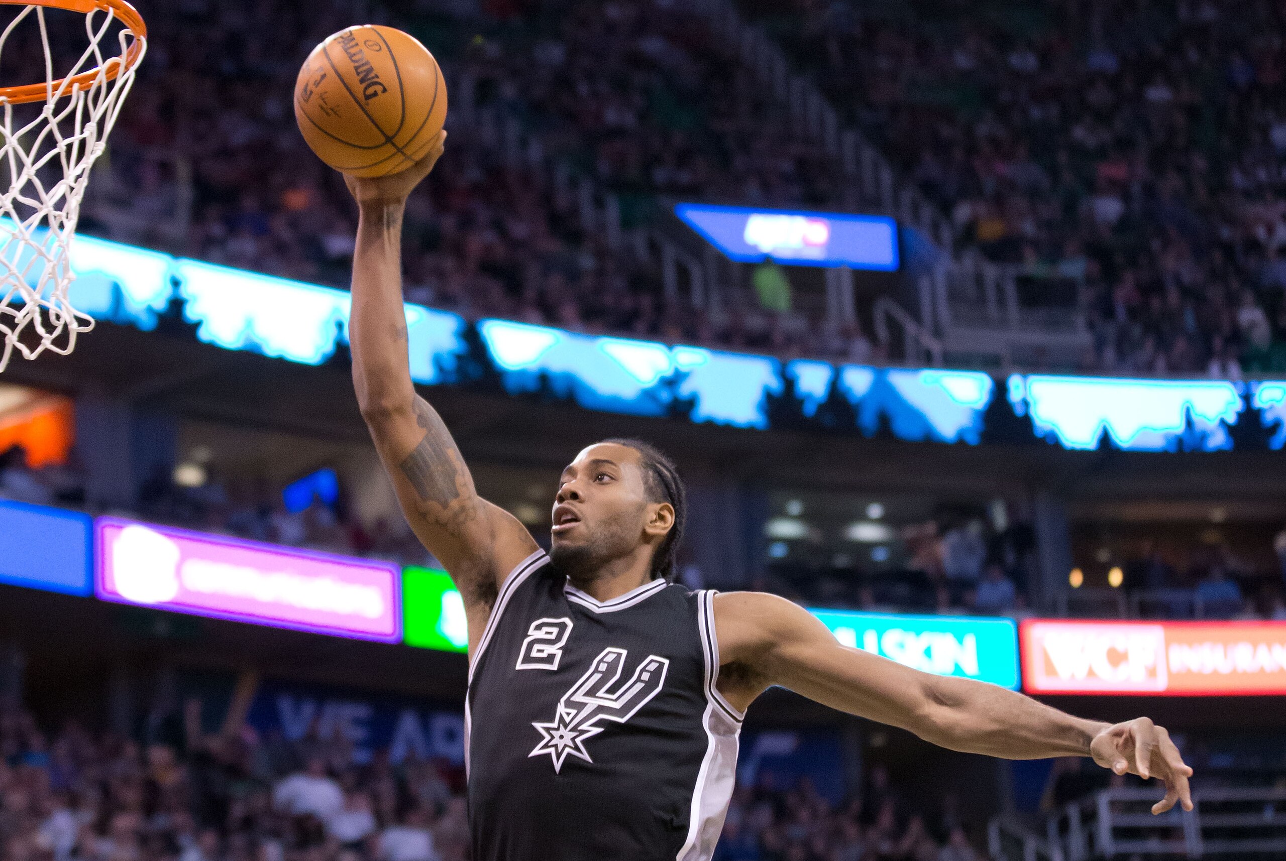 Feb 25, 2016; Salt Lake City, UT, USA; San Antonio Spurs forward Kawhi Leonard (2) goes up for a shot during the second half against the Utah Jazz at Vivint Smart Home Arena. San Antonio won 96-78. Mandatory Credit: Russ Isabella-USA TODAY Sports