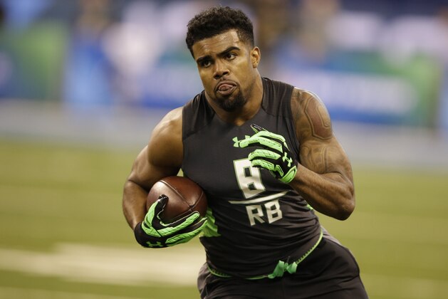 Ohio State running back Ezekiel Elliott runs a drill at the NFL football scouting combine in Saturday, Feb. 27, 2016, in Indianapolis. (AP Photo/Darron Cummings) Ohio State running back Ezekiel Elliott runs a drill at the NFL football scouting combine in Saturday, Feb. 27, 2016, in Indianapolis. (AP Photo/Darron Cummings)
