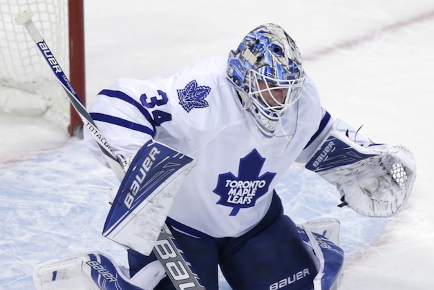 Toronto Maple Leafs goalie James Reimer (34) makes a save during the overtime of an NHL hockey game in Boston, Tuesday, Feb. 2, 2016. (AP Photo/Charles Krupa)
