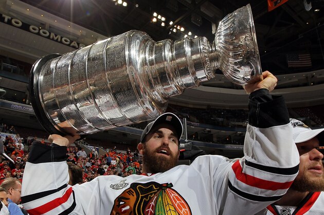 PHILADELPHIA - JUNE 09:  Andrew Ladd #16 of the Chicago Blackhawks hoists the Stanley Cup after teammate Patrick Kane scored the game-winning goal in overtime to defeat the Philadelphia Flyers 4-3 and win the Stanley Cup in Game Six of the 2010 NHL Stanley Cup Final at the Wachovia Center on June 9, 2010 in Philadelphia, Pennsylvania.  (Photo by Jim McIsaac/Getty Images)