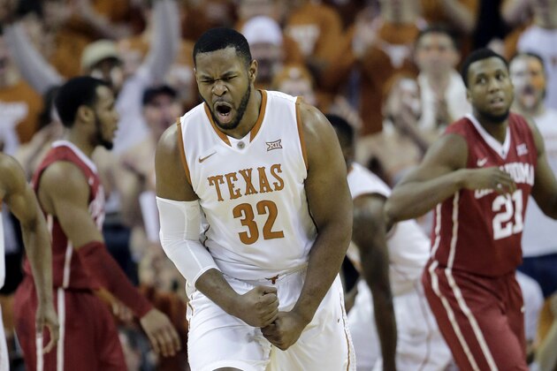 Texas forward Shaquille Cleare (32) celebrates a score against Oklahoma during the first half of an NCAA college basketball game, Saturday, Feb. 27, 2016, in Austin, Texas. (AP Photo/Eric Gay)