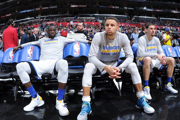 LOS ANGELES, CA - FEBRUARY 20: Draymond Green #23, Stephen Curry #30 and Klay Thompson #11 of the Golden State Warriors are seen before the game against the Los Angeles Clippers on February 20, 2016 at STAPLES Center in Los Angeles, California. NOTE TO USER: User expressly acknowledges and agrees that, by downloading and/or using this Photograph, user is consenting to the terms and conditions of the Getty Images License Agreement. Mandatory Copyright Notice: Copyright 2016 NBAE (Photo by Andrew D. Bernstein/NBAE via Getty Images)