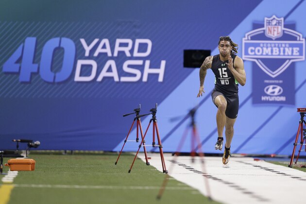 Notre Dame receiver Will Fuller runs the 40-yard dash at the NFL football scouting combine in Saturday, Feb. 27, 2016, in Indianapolis. (AP Photo/Darron Cummings)
