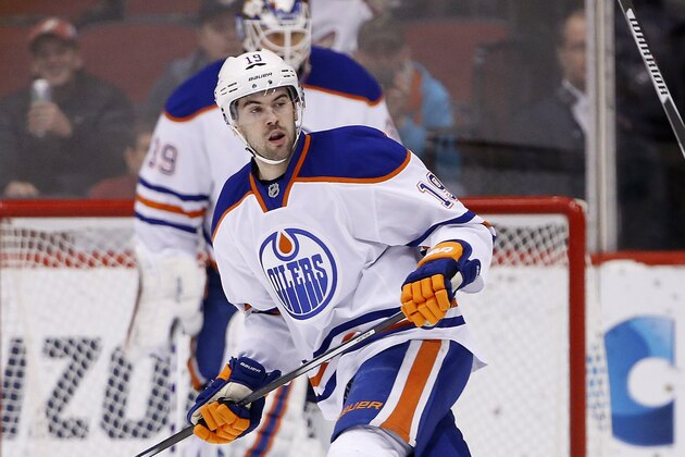 Edmonton Oilers' Justin Schultz watches the movement of the puck during the first period of an NHL hockey game against the Arizona Coyotes Tuesday, Jan. 12, 2016, in Glendale, Ariz.  The Coyotes defeated the Oilers 4-3 in overtime. (AP Photo/Ross D. Franklin)
