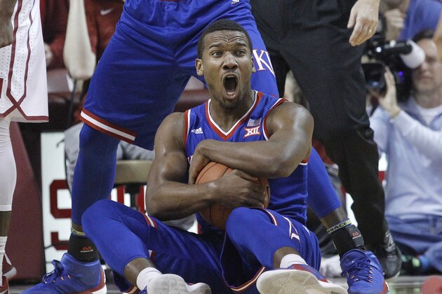 Kansas guard Wayne Selden Jr. holds the ball in the second half of an NCAA college basketball game against Oklahoma in Norman, Okla., Saturday, Feb. 13, 2016. (AP Photo/Sue Ogrocki)