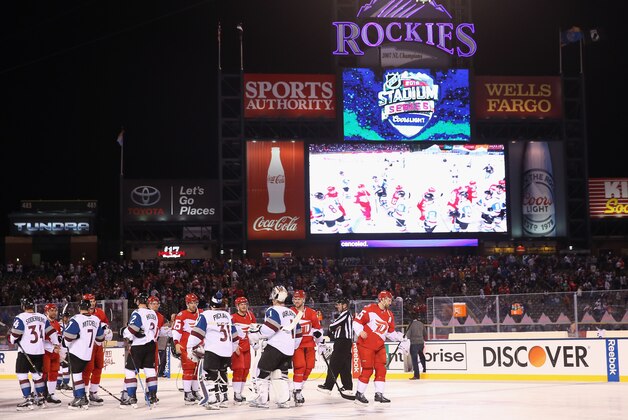 DENVER, CO - FEBRUARY 27: The Colorado Avalanche and the Detroit Red Wings shake hands following the Red Wings 5-3 victory over the Avalanche at Coors Field during the 2016 Coors Light Stadium Series game on February 27, 2016 in Denver, Colorado.  (Photo by Doug Pensinger/Getty Images)
