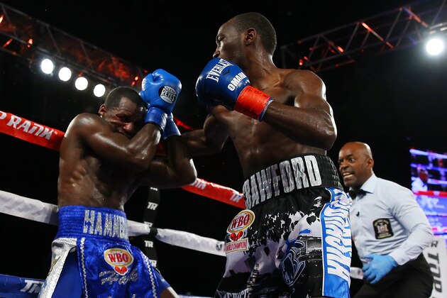 NEW YORK, NY - FEBRUARY 27:  Terence Crawford (R) punches Henry Lundy (L) during their WBO World Championship bout at Madison Square Garden on February 27, 2016 in New York City.  (Photo by Mike Stobe/Getty Images)