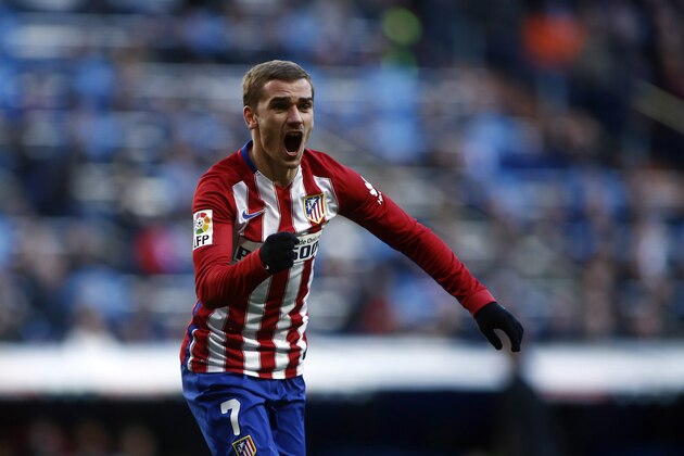 Atletico's Antoine Griezmann celebrates after scoring the opening goal during a Spanish La Liga soccer match between Real Madrid and Atletico Madrid at the Santiago Bernabeu stadium in Madrid, Spain, Saturday Feb. 27, 2016. (AP Photo/Oscar del Pozo)