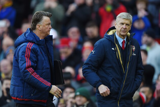 MANCHESTER, ENGLAND - FEBRUARY 28:  Arsene Wenger (R), Manager of Arsenal walks back to the dressing rooms with Louis van Gaal, Manager of Manchester United after the Barclays Premier League match between Manchester United and Arsenal at Old Trafford on February 28, 2016 in Manchester, England.  (Photo by Shaun Botterill/Getty Images)