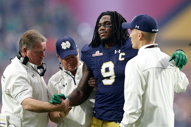 GLENDALE, AZ - JANUARY 01:  Linebacker Jaylon Smith #9 of the Notre Dame Fighting Irish walks off the field after an injury during the first quarter of the BattleFrog Fiesta Bowl against the Ohio State Buckeyes at University of Phoenix Stadium on January 1, 2016 in Glendale, Arizona.  The Buckeyes defeated the Fighting Irish 44-28.  (Photo by Christian Petersen/Getty Images)