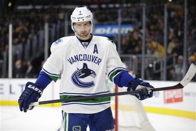 FILE - In this Dec. 1, 2015, file photo, Vancouver Canucks' Dan Hamhuis skates during the second period of an NHL hockey game against the Los Angeles Kings, in Los Angeles. Hamhuis is a hot name on the trade market. (AP Photo/Jae C. Hong, File)