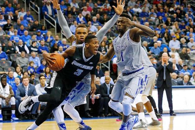 NEWARK, NJ - FEBRUARY 25: Kris Dunn #3 of the Providence Friars drives to the basket as Derrick Gordon #32, left, and Michael Nzei #1 of the Seton Hall Pirates defend during the first half of an NCAA college basketball game on February 25, 2016 at the Prudential Center in Newark, New Jersey. (Photo by Rich Schultz /Getty Images) NEWARK, NJ - FEBRUARY 25: Kris Dunn #3 of the Providence Friars drives to the basket as Derrick Gordon #32, left, and Michael Nzei #1 of the Seton Hall Pirates defend during the first half of an NCAA college basketball game on February 25, 2016 at the Prudential Center in Newark, New Jersey. (Photo by Rich Schultz /Getty Images)