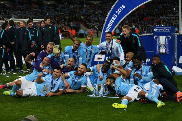 LONDON, ENGLAND - FEBRUARY 28 :  Manchester City celebrate the win with the trophy after the Capital One Cup Final match between Liverpool and Manchester City at Wembley Stadium on February 28, 2016 in London, England.  (Photo by Catherine Ivill - AMA/Getty Images)