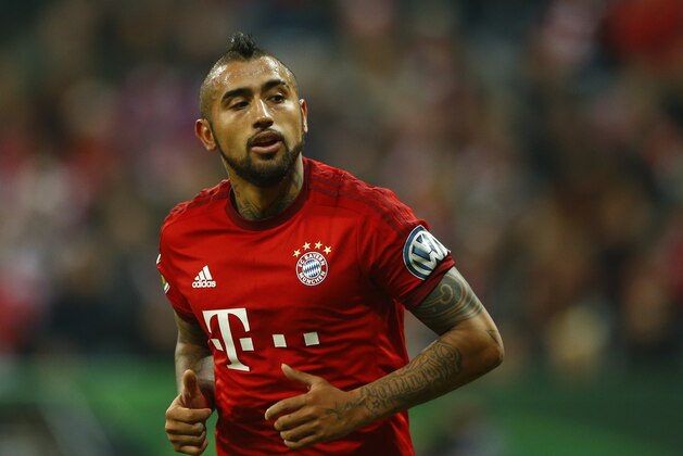 Bayern's Arturo Vidal watches his teammates during the German soccer cup (DFB Pokal) match between FC Bayern Munich and SV Darmstadt 98 at the Allianz Arena stadium in Munich, Germany, Tuesday, Dec. 15, 2015. (AP Photo/Matthias Schrader)