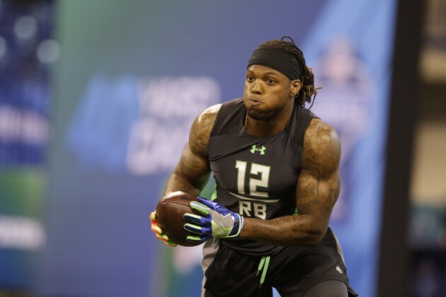 Alabama running back Derrick Henry runs a drill at the NFL football scouting combine in Saturday, Feb. 27, 2016, in Indianapolis. (AP Photo/Darron Cummings)