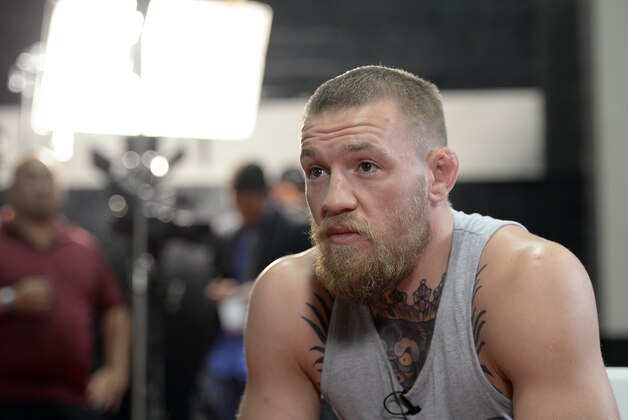 TORRENCE, CA - FEBRUARY 24:  UFC featherweight champion Conor McGregor speaks during an interview after a news conference with lightweight contender Nate Diaz at UFC Gym February 24, 2016, in Torrance, California. (Photo by Kevork Djansezian/Getty Images)