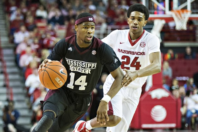 FAYETTEVILLE, AR - JANUARY 9:  Malik Newman #14 of the Mississippi State Bulldogs drives down the court against Jimmy Whitt #24 of the Arkansas Razorbacks at Bud Walton Arena on January 9, 2016 in Fayetteville, Arkansas.  The Razorbacks defeated the Bulldogs 82-68.  (Photo by Wesley Hitt/Getty Images)